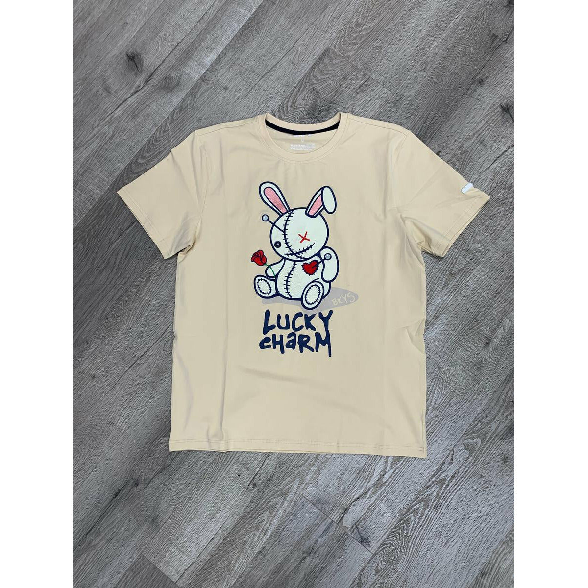 Black Keys Lucky Charm Sand Tee (T934) - Women's stylish and comfortable t-shirt in a sandy color with a lucky charm graphic