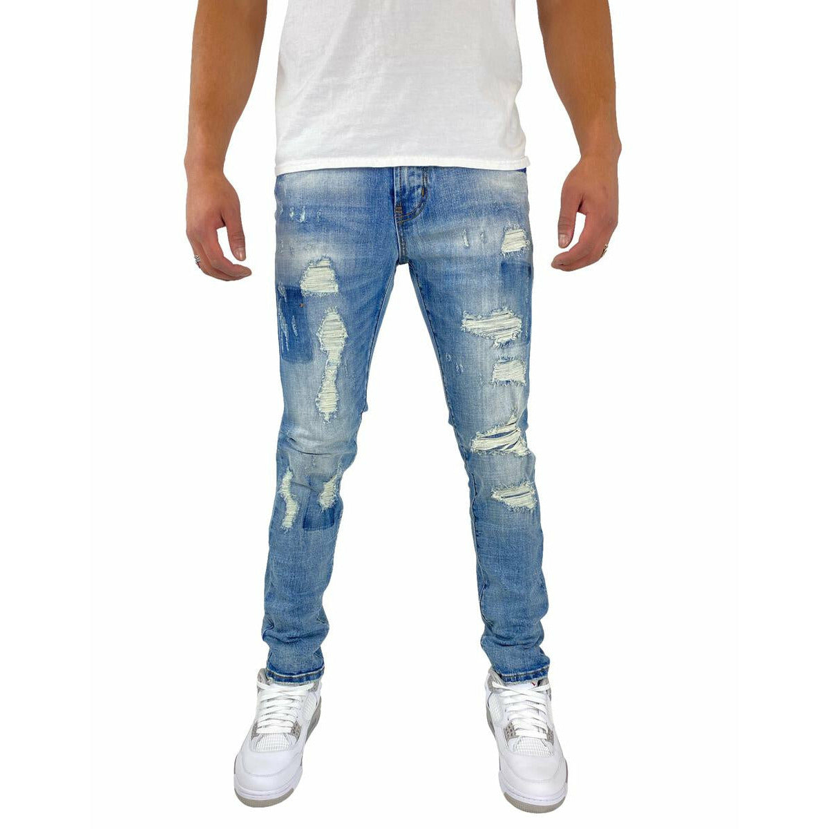 Dark blue Preme Indigo Denim Ripped Jeans (PR-WB-902) featuring distressed details and a stylish, relaxed fit