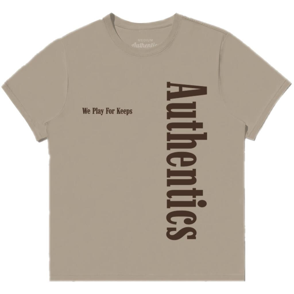 Close-up of the Authentics SIDE LOGO TEE in Mushroom color, featuring the brand logo on the side of the shirt