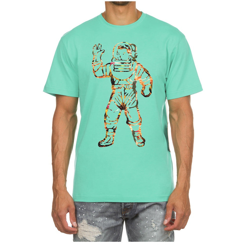 BBC Ice Green BB Astro Blur SS Tee (831-3205) shirt on a hanger in a bright, modern setting with other clothing items, showcasing its sleek design and vibrant color