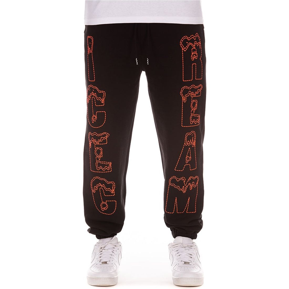Close-up of Snow Tops Black Sweatpants with snowflake design on the side