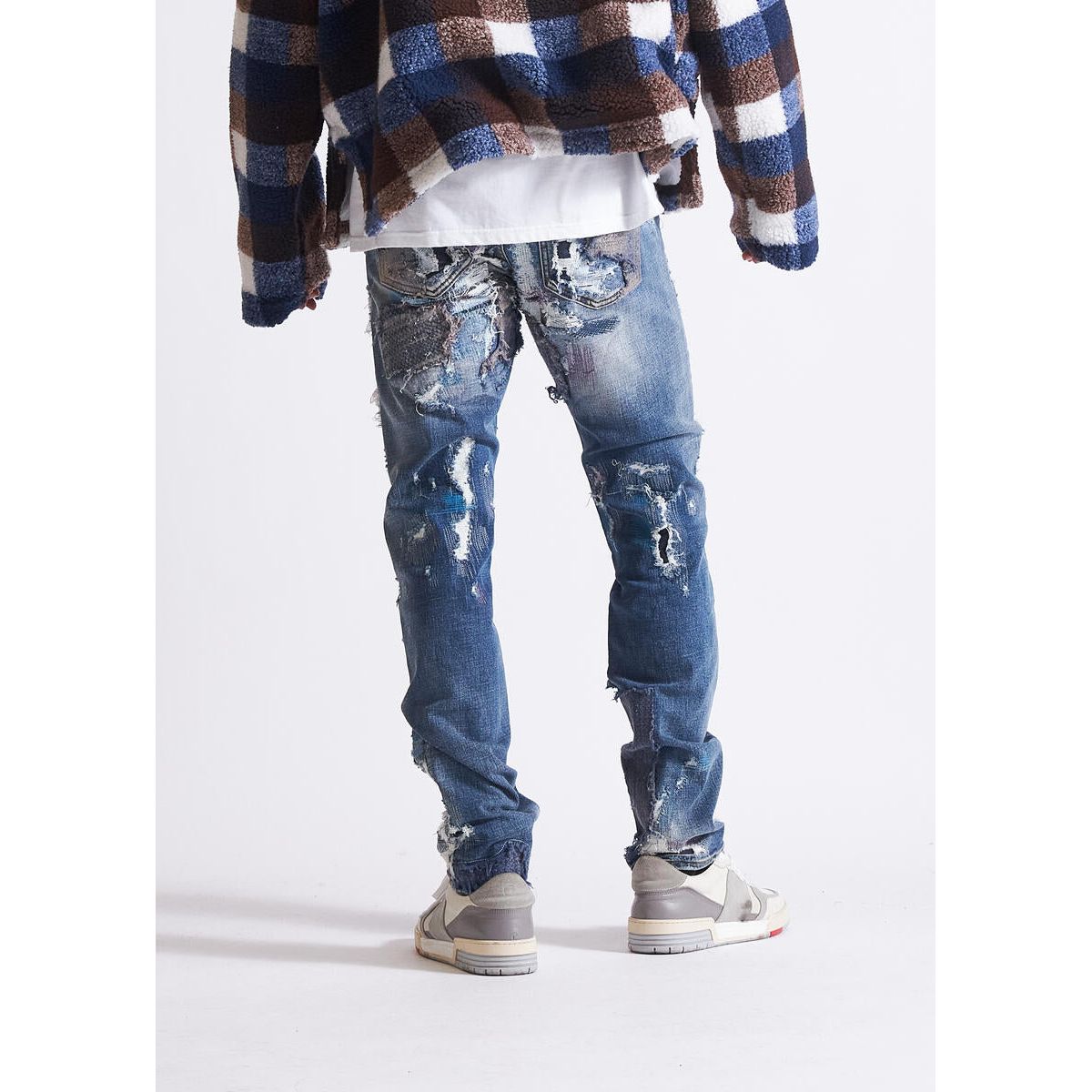 Embellish Mendez Light Blue Ripped Denim Jeans (EMBHOL23-042) with distressed detailing and frayed hem 