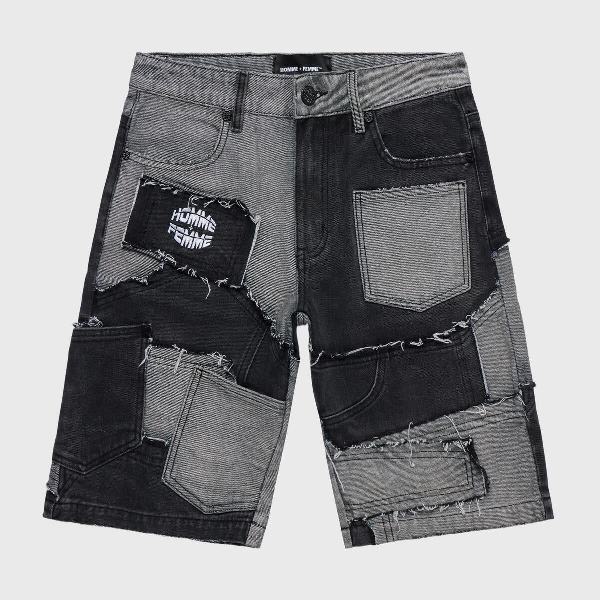 Front view of black denim shorts with patchwork design and frayed edges