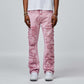 Homme + Femme Twilight Pink Denim Jeans with distressed details and raw hem