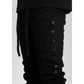 Side view of Guapi All Black Layer Stacked Denim with stacked layers design