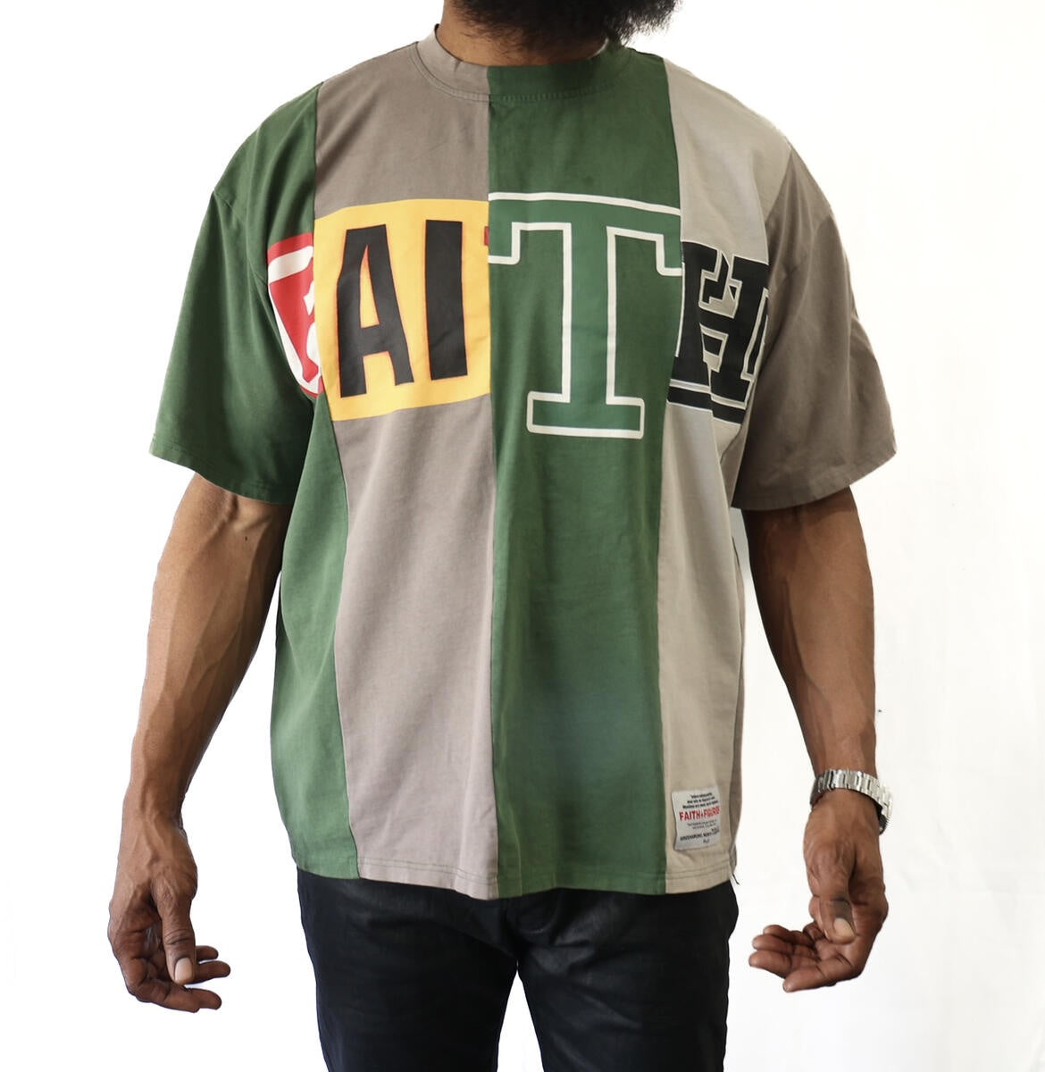 Faith+Figures It's Just Us SS Tee - Green Multi, a stylish and vibrant short sleeve t-shirt with an eye-catching design and comfortable fit