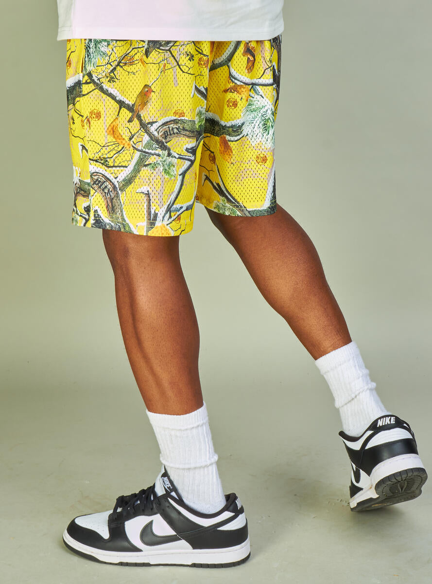  Bright yellow shorts with a unique 'Branches' design, ideal for political activities or everyday use