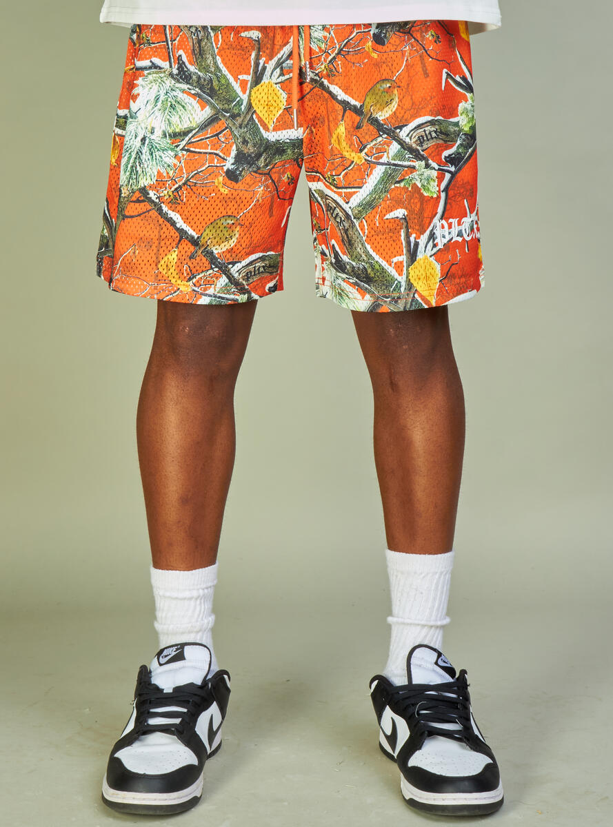 Orange mesh shorts with Branches design, perfect for political enthusiasts