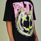  Back view of black and pink Politics PLTX Graphic Tee showing the logo and text detail