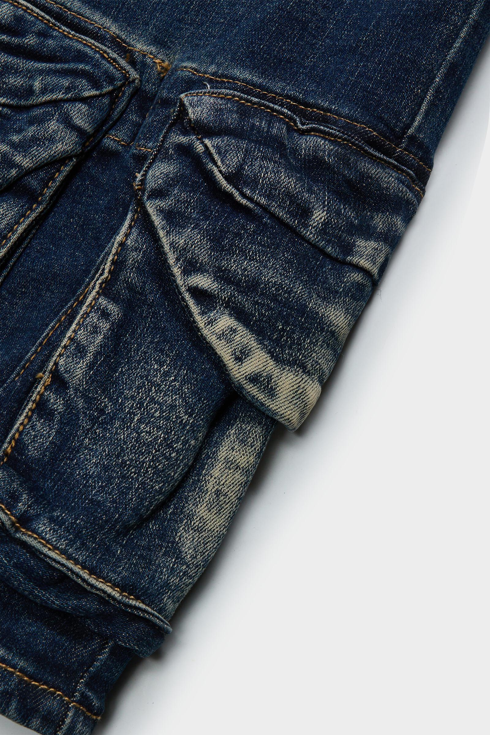 Valabasas Ram Dark Blue Baggy Denim Jeans: A close-up shot of the front of the jeans, displaying the vintage wash and distressed detailing, perfect for a casual and stylish look