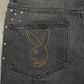 Side view of the Homme + Femme Playboy denim jeans, showcasing the slim fit and black color