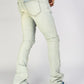  Side view of Politics Jeans Light Vintage Blue Stacked Distressed Denim (Uzi505) showcasing the vintage blue wash and stylish fit