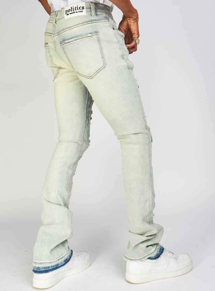  Side view of Politics Jeans Light Vintage Blue Stacked Distressed Denim (Uzi505) showcasing the vintage blue wash and stylish fit