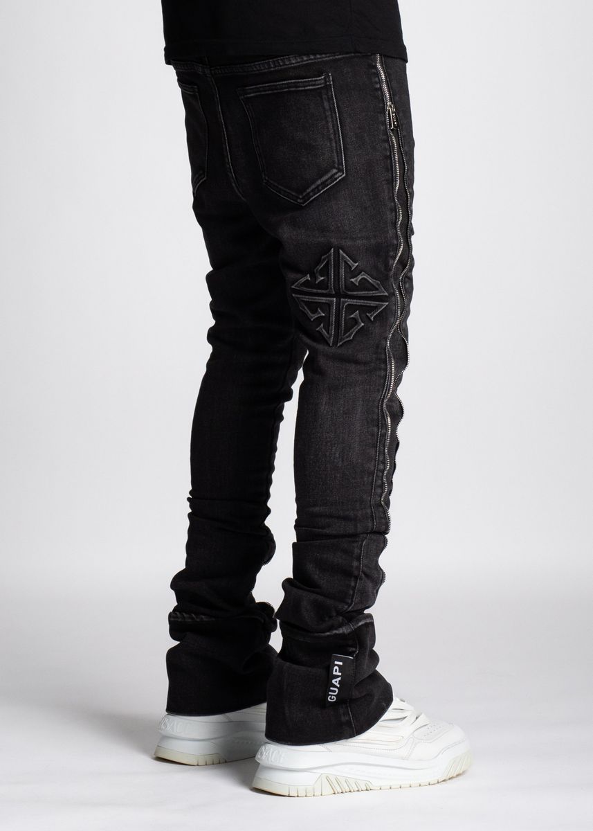  Side angle of Guapi Iron Grey Stacked Zipped Denim Jeans showing the stacked design