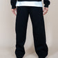 Model is 6’ and wears size M EPTM Perfect Baggy Fleece Pants in Black