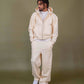 Baggy fit cream pants with logo embroidery and model wearing size M