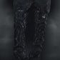 Black denim jeans with a stylish and edgy rhinestone design
