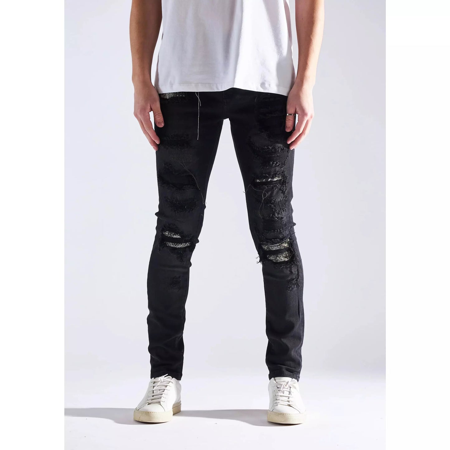 Embellish Oden Ripped Black Denim Jeans (EMBHOL21-1-26) featuring distressed detailing and a classic black wash for a stylish, edgy look