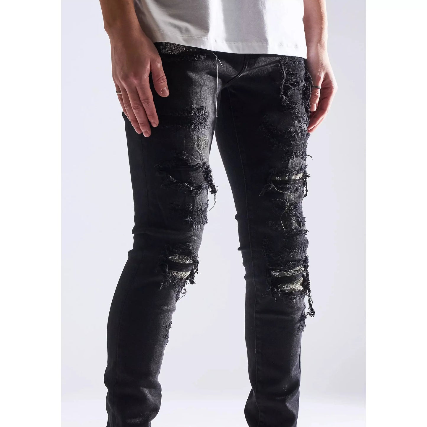 Embellish Oden Ripped Black Denim Jeans with stylish accessories