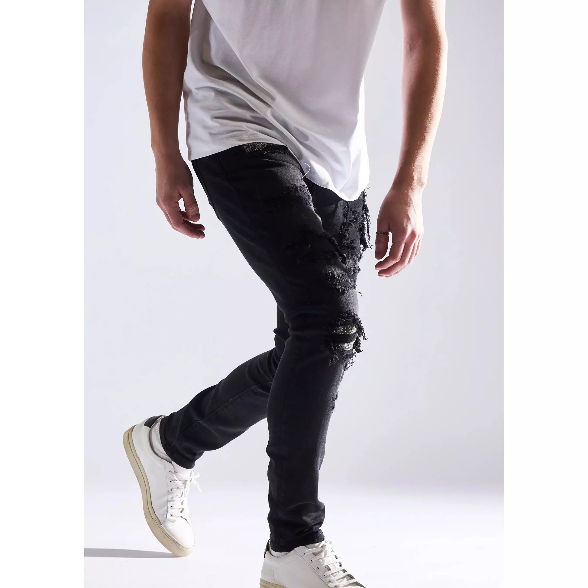 EMBHOL21-1-26 denim jeans with intricate distressing and comfortable fit