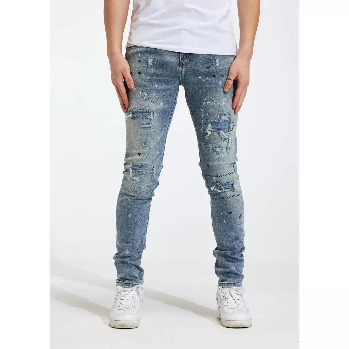 Crysp Denim Blue Arctic Jeans w/Tears featuring distressed details and frayed hems