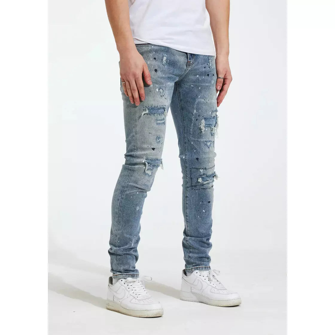  Trendy Crysp Denim Blue Arctic Jeans with strategically placed tears and a vintage-inspired, light blue hue