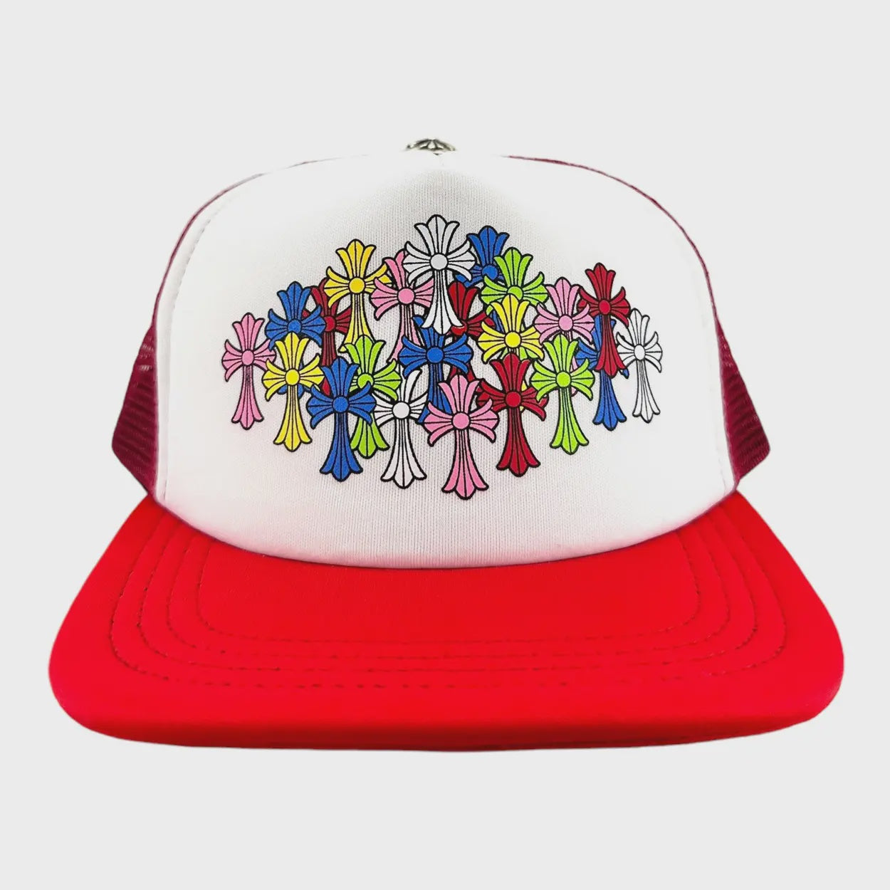 Red and white Chrome Hearts trucker hat adorned with multi-color crosses