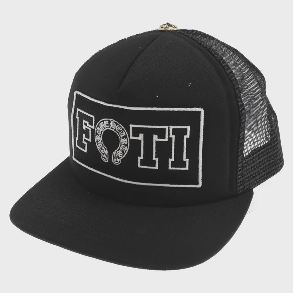 Black trucker hat with Chrome Hearts Foti logo embroidery in black