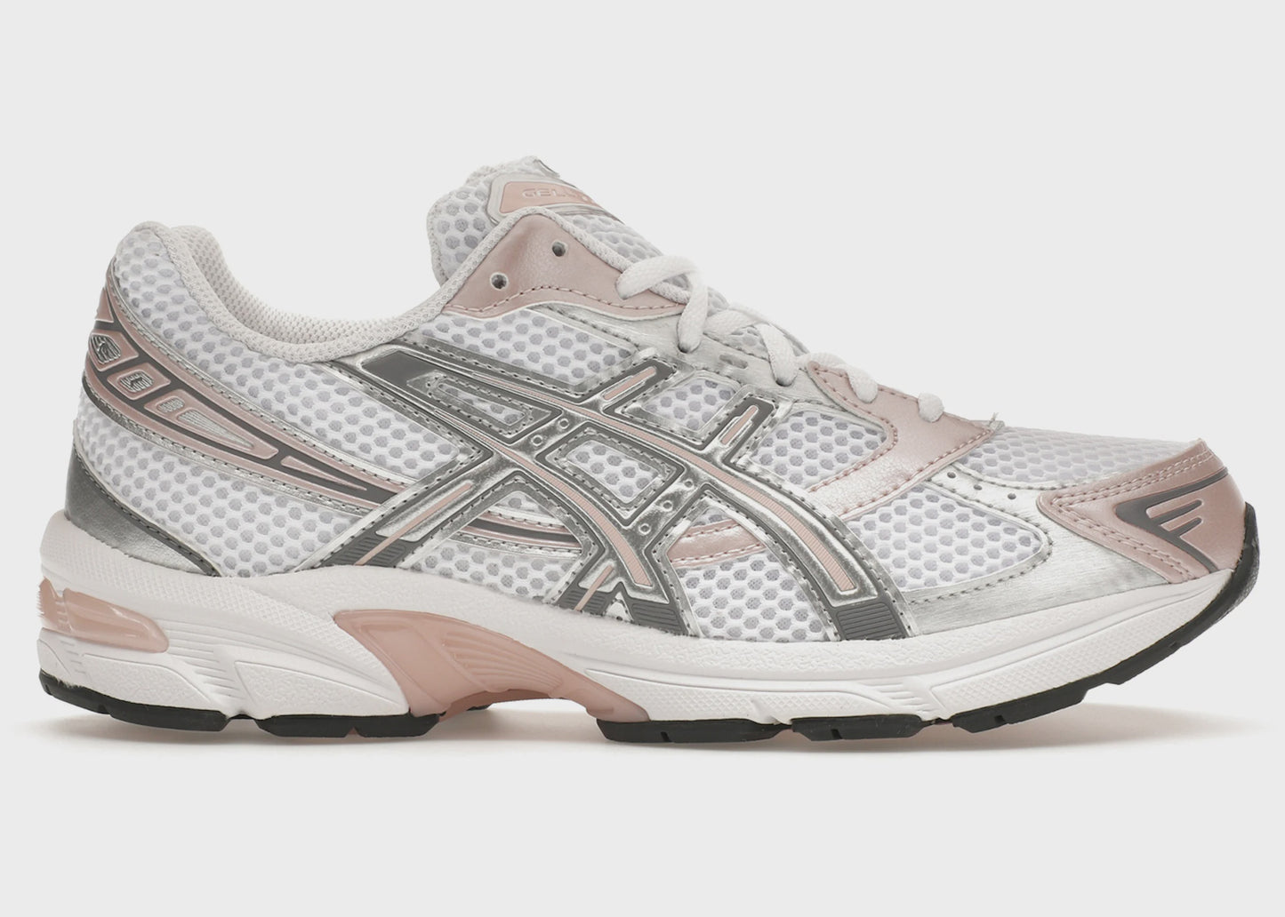 A close-up image of the ASICS Gel-1130 running shoe in white, featuring neutral pink accents and designed for a comfortable and supportive fit for women