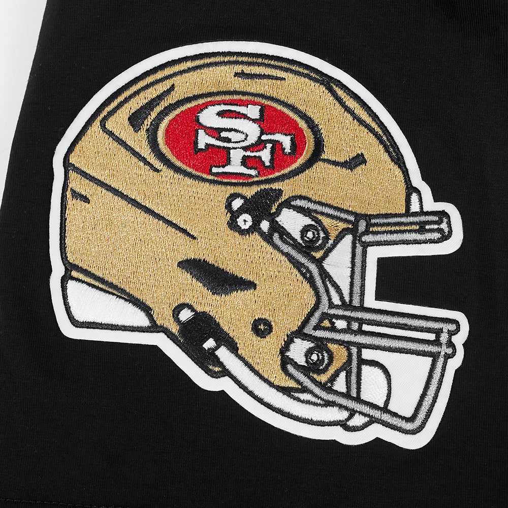 Detailed image of San Francisco 49ers team badge printed on black Pro Standard T-shirt