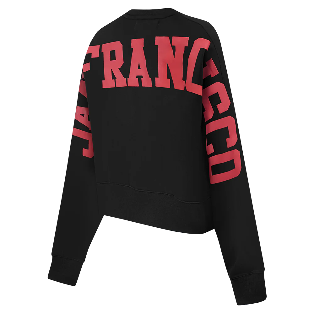 Side angle of the black Wingspan Women's Crewneck showing comfortable fit and team branding details