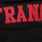 Lifestyle image of a woman wearing the black Pro Standard San Francisco 49ers Wingspan Women's Crewneck in casual setting
