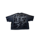 Close-up of the Rare Peace No Guarantee Dark Grey Tee showing the high-quality 100% cotton fabric and printed flocking details