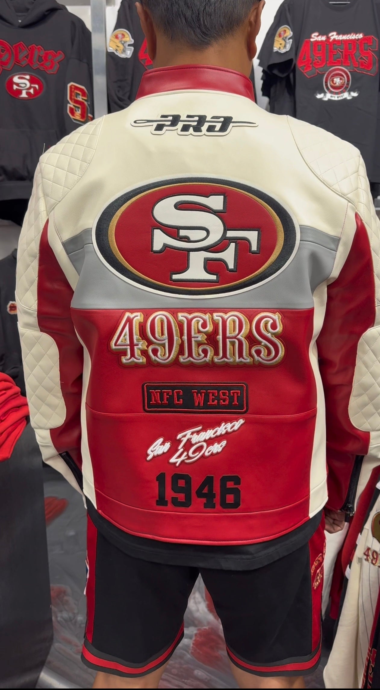 Pro Standard San Francisco 49ers egg-shell and red moto jacket featuring team branding and durable material