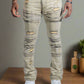Close-up of Makobi Bruno Dirt Ripped Denim Jeans highlighting ripped details and durable fabric