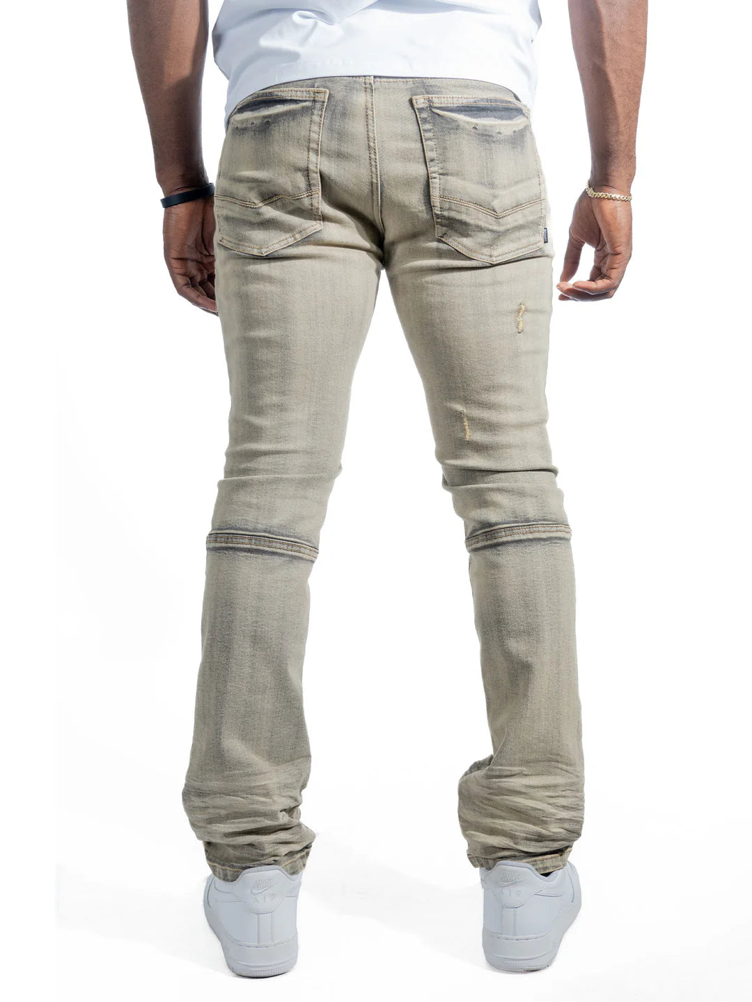 Makobi Bruno M1965 denim jeans showcasing dirt-ripped design and modern fashion appeal