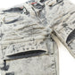 Detailed shot of Makobi Bruno Grey Ripped Denim Jeans focusing on the ripped sections and stitching