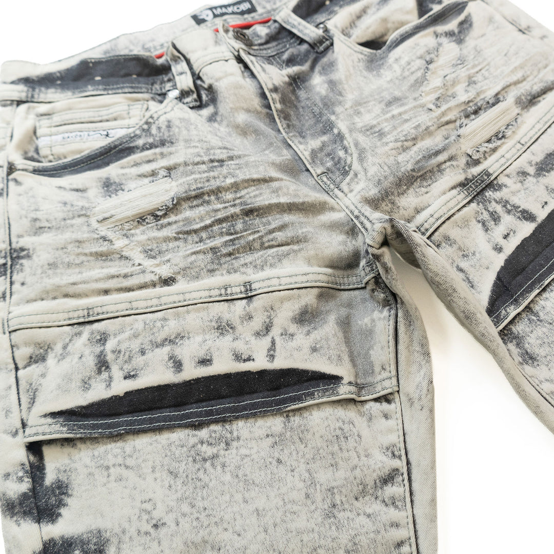 Detailed shot of Makobi Bruno Grey Ripped Denim Jeans focusing on the ripped sections and stitching