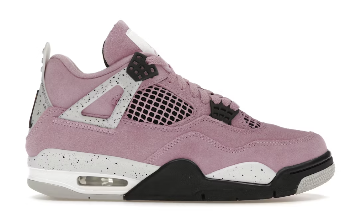 Close-up image of the Jordan 4 Retro Orchid sneakers for women, with purple and white colorway (AQ9129-501), featuring iconic Air Jordan branding and stylish design