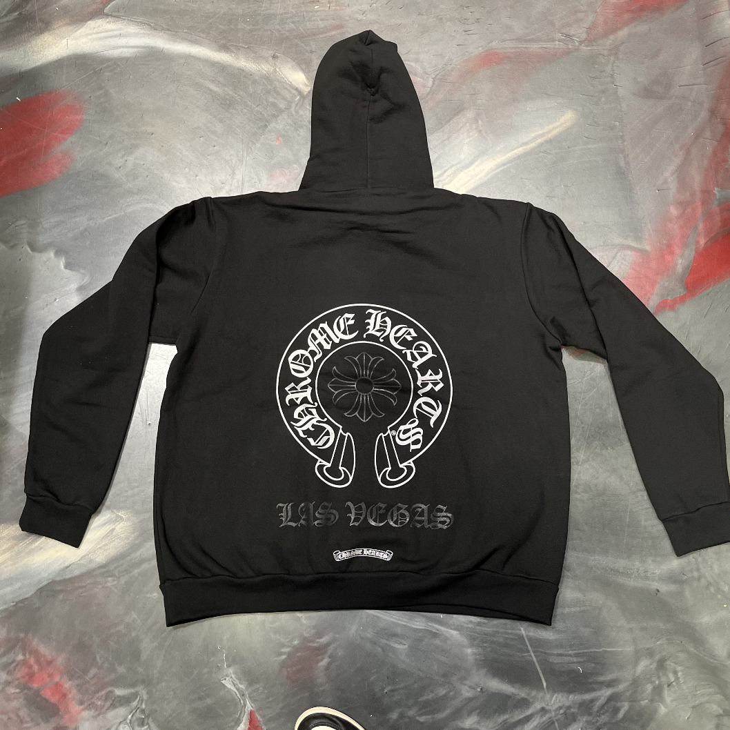 Black and white Chrome Hearts Horseshoe Las Vegas Exclusive Hoodie on display