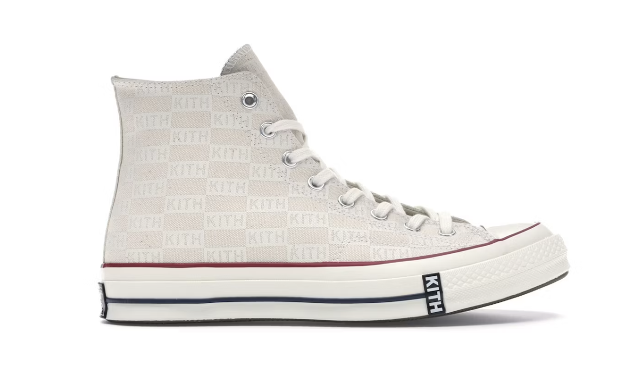 A close-up image of Converse Chuck Taylor All Star 70 Hi - Kith Classics Parchment sneakers with SKU 165523C, featuring a cream-colored canvas upper and classic Chuck Taylor design