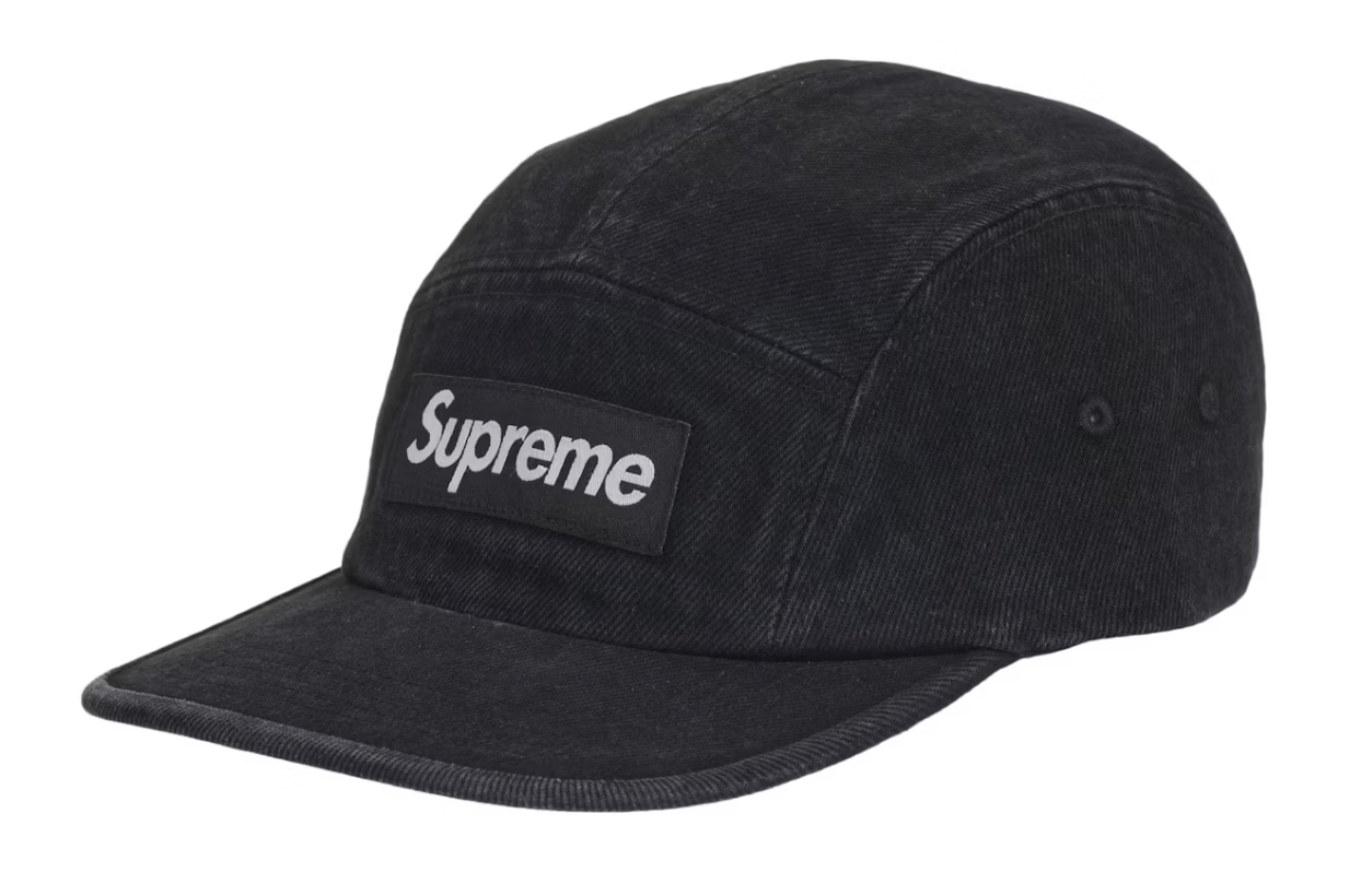 Brand new Supreme Denim Camp Cap in black with SS25 label, showcasing classic design and deadstock quality