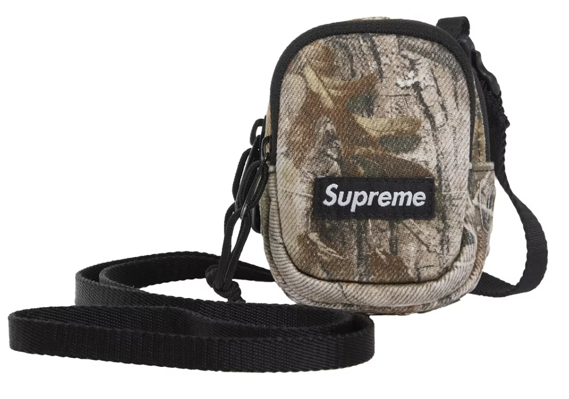 A brand new Supreme Denim Mini Utility Bag featuring Realtree AP Camo pattern from FW25 collection, deadstock