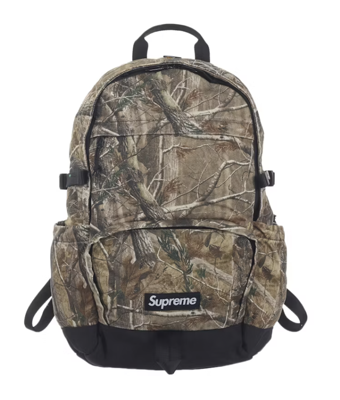 A Supreme Denim Backpack featuring Realtree AP Camo pattern from FW25 collection, brand new deadstock