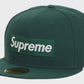 A close-up image of the Supreme Sharpie Box Logo New Era Fitted Hat in green, showcasing the embroidered logo and high-quality fabric