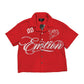 Close up of the Mixed Emotion Signature Red Button Up shirt with intricate red stitching and button details