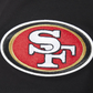 Full-length image of a model wearing the black San Francisco 49ers City Ransom Tee showcasing casual style