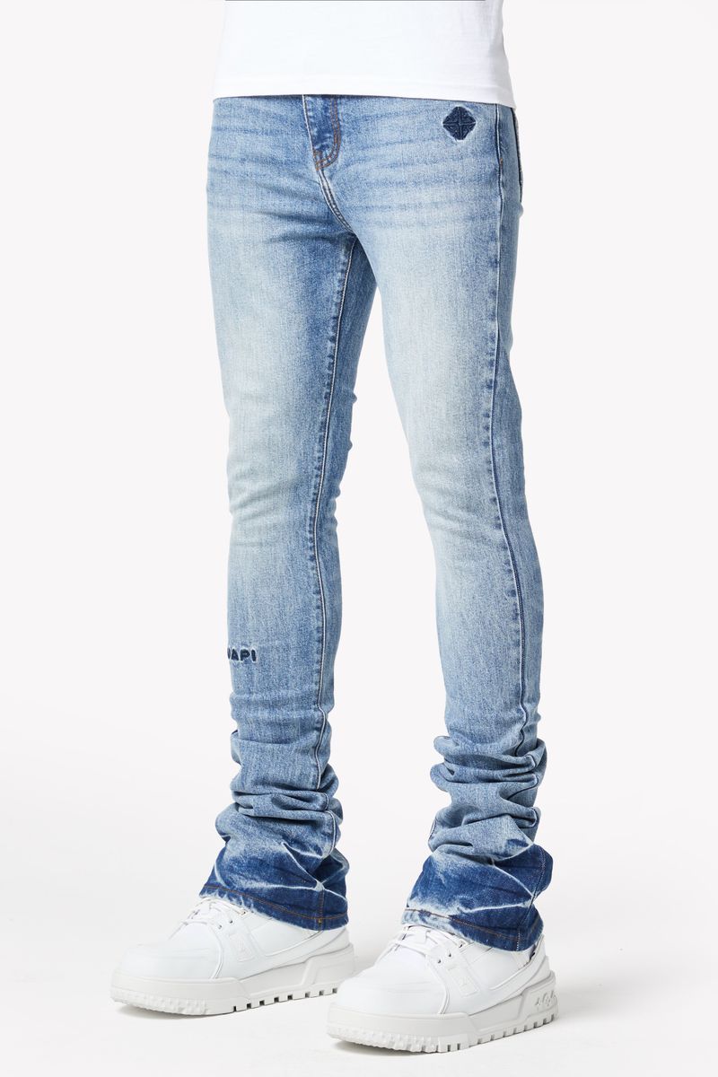 Close-up of the front pocket and button detail of the Guapi Pacific Blue Basics Stacked Denim