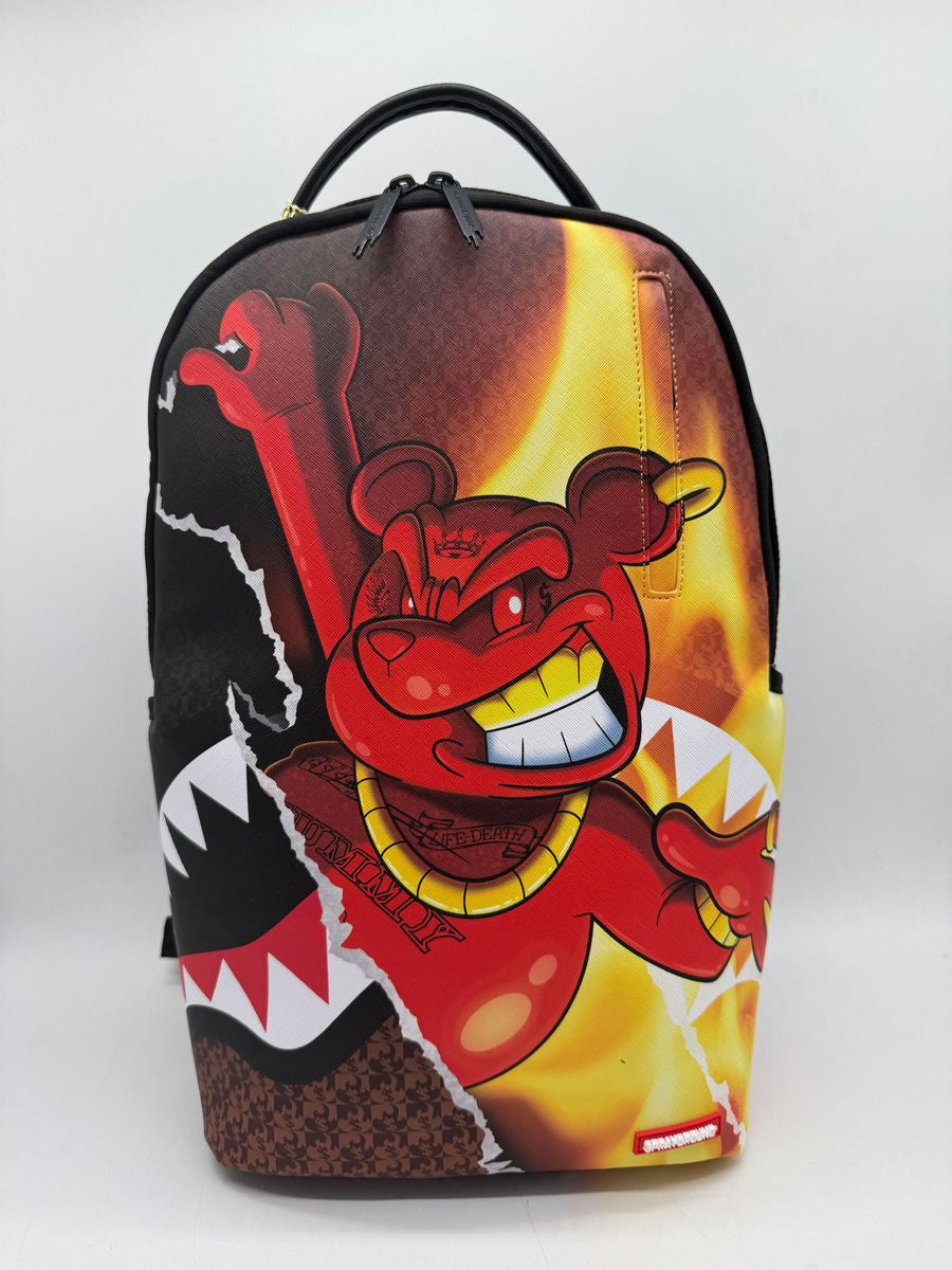 Close-up of the Sprayground Diablo Fire Tear DLXSV Backpack showcasing its 18-inch height and eye-catching artwork