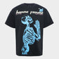 Homme + Femme Skeleton Tee in Black and Blue colorway on a male model, front view, showcasing the unique skeleton design and contrast color combination